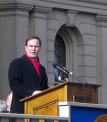 Michigan Attorney General Bill Schuette carries the tea party water jug